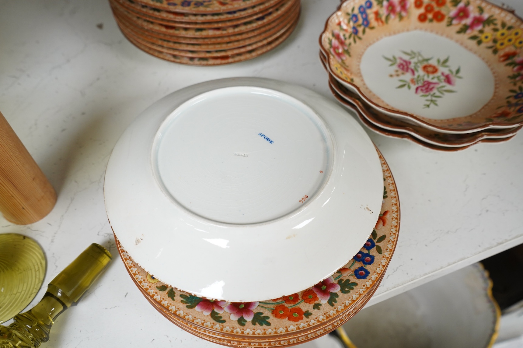 An early 19th century Spode printed and hand painted part dessert service, plates 20cm in diameter